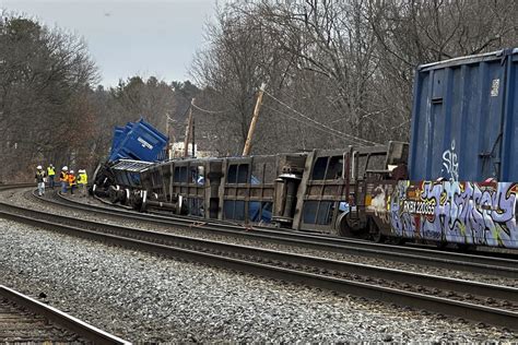 Train derails in Ayer, spilling trash and recycling from 10 containers